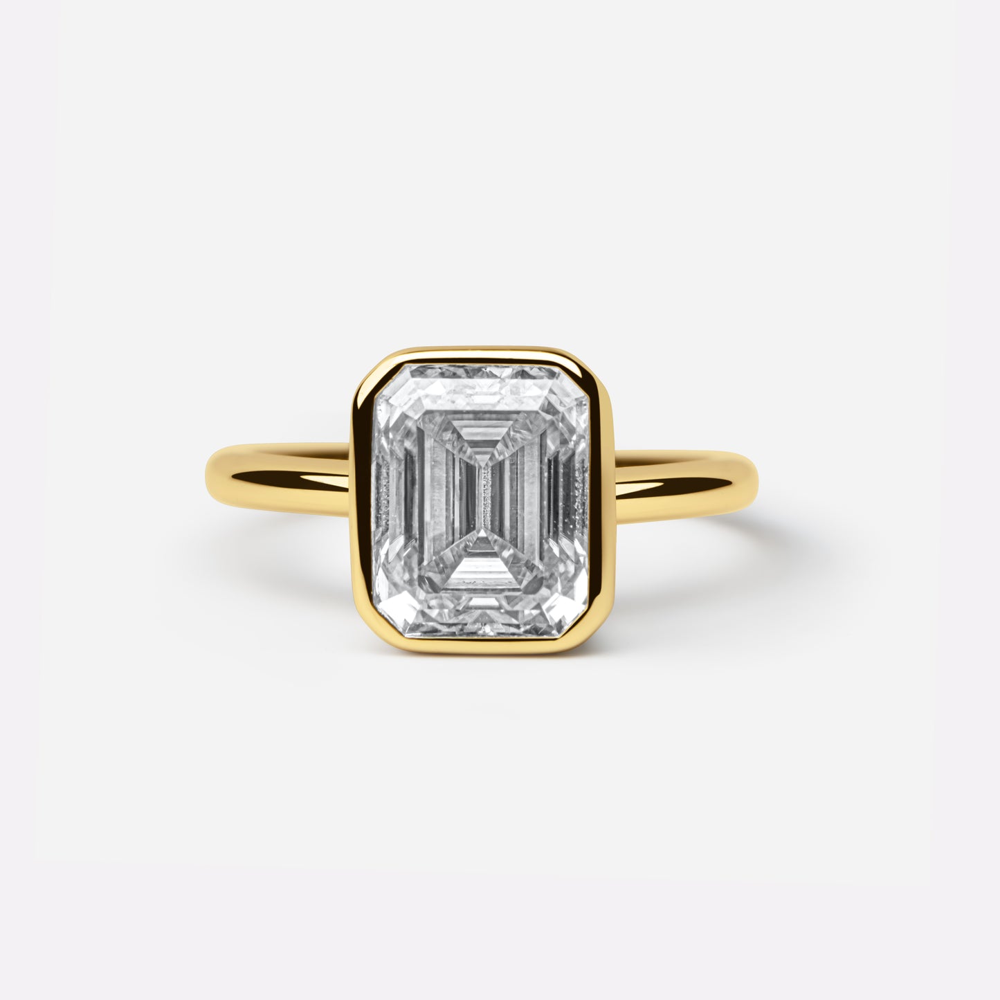 The Aurora Ring - 3Crt Emerald Bezel Ring
